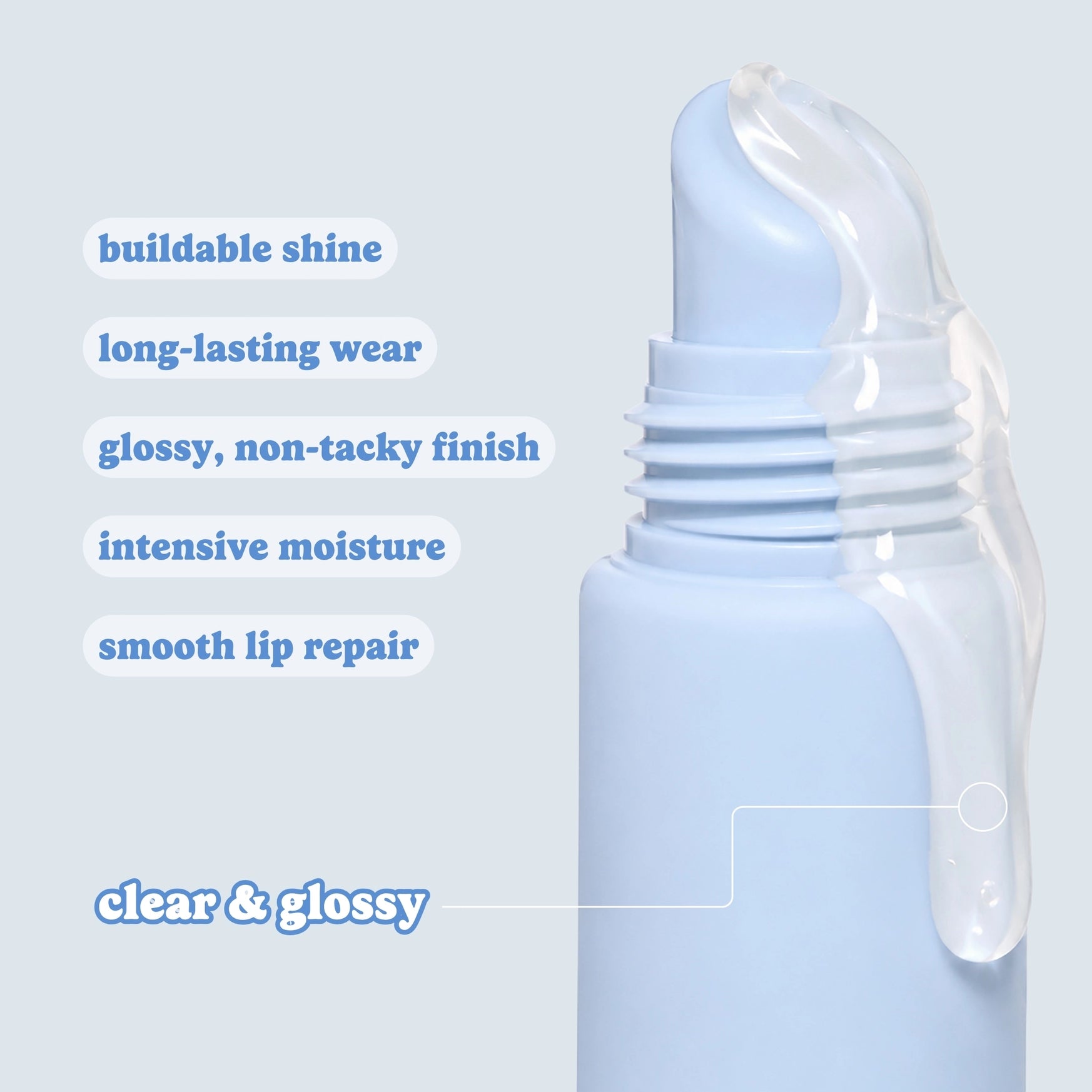A light blue cosmetic tube with a clear glossy cream product dripping from the top, shown on a pale blue background with marketing text listing benefits like buildable shine, long-lasting wear, and clear & glossy finish.