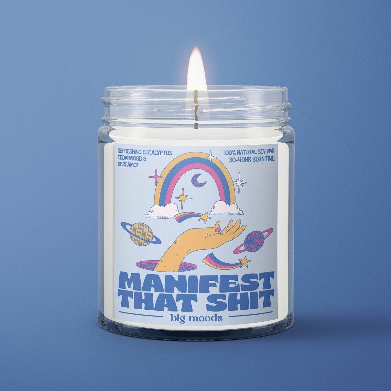 Candle in a jar with a colorful label on a blue background