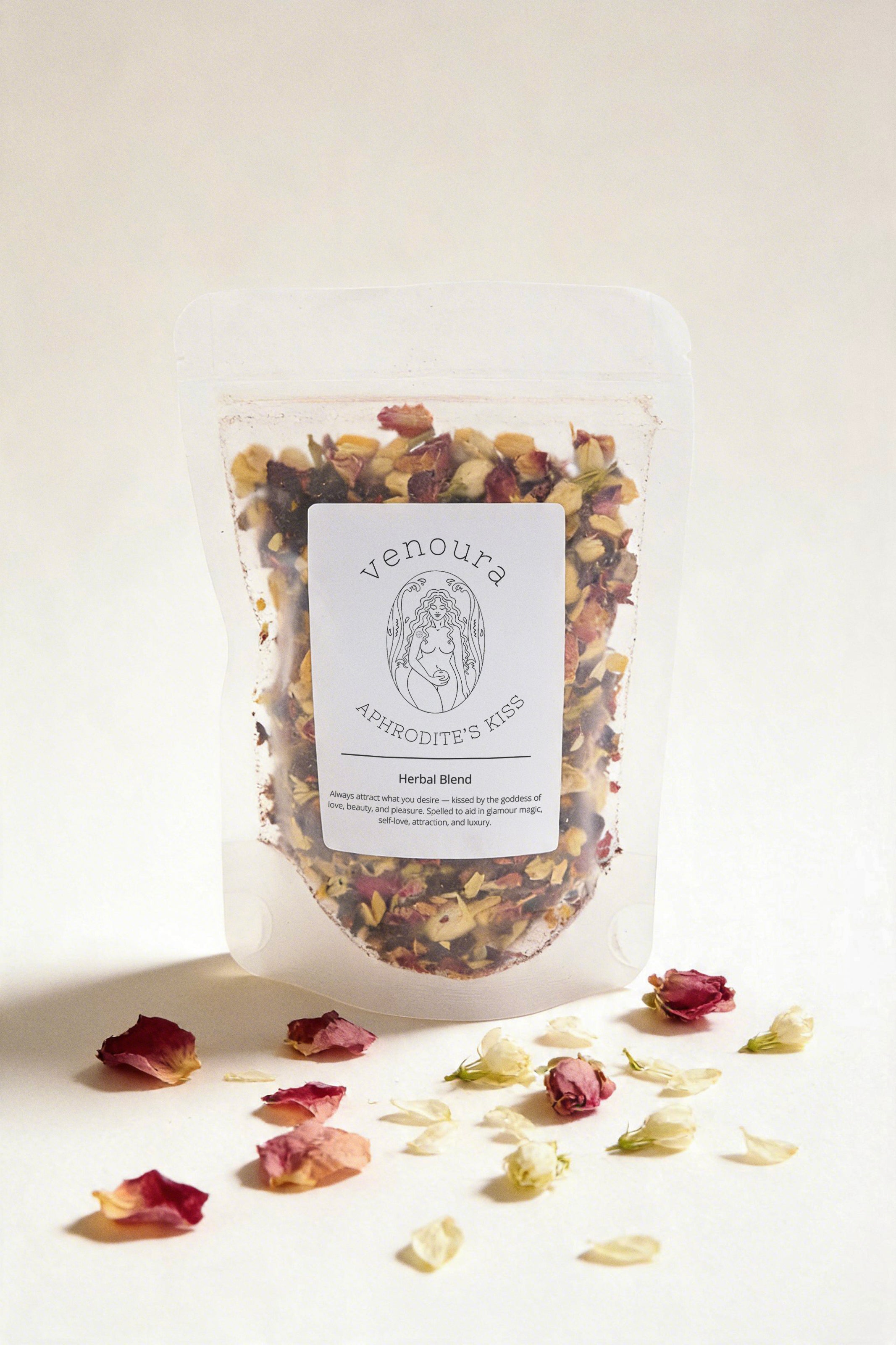 A stand-up pouch of Venoura Astrology Rose and jasmine Herbal Blend on a light beige background, with scattered dried rose petals around the base.