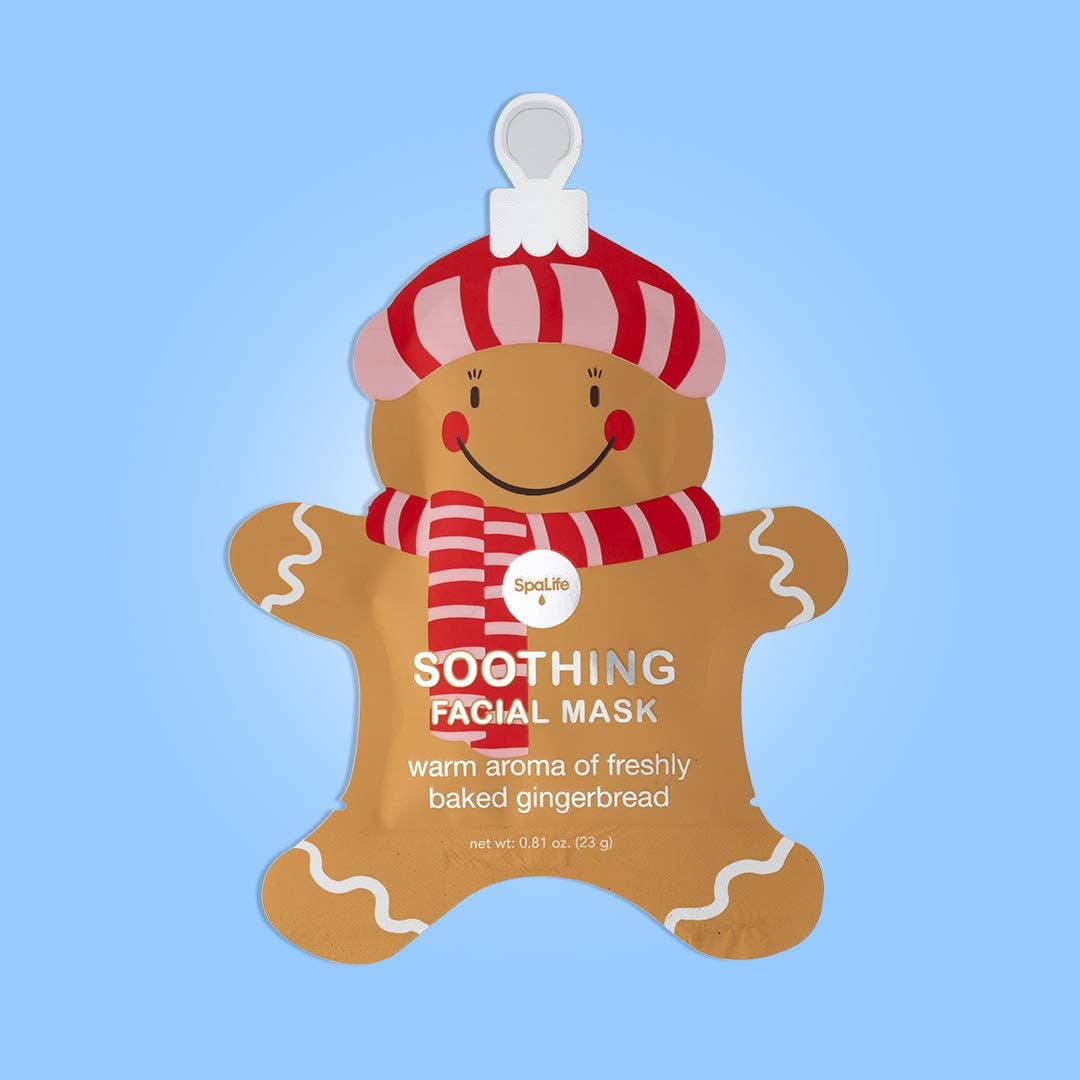 Gingerbread man-shaped facial mask for soothing with a blue background