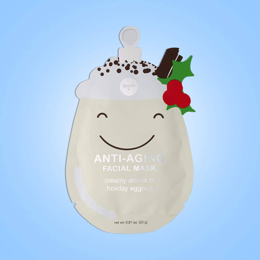 Anti-aging facial mask with holiday eggnog design on a blue background