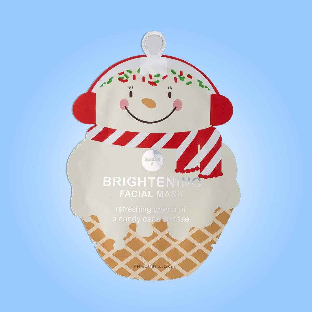 Brightening facial mask packaging with a candy cane sundae-themed design on a blue background