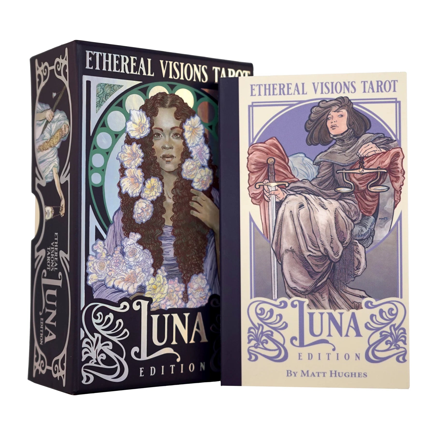 Ethereal Visions Tarot: Luna Edition card deck shown with its illustrated box and a single card. The packaging features Art Nouveau-style artwork with a dark navy base and ornate white decorative flourishes, while the card has a cream background with purple and muted blue illustration details.