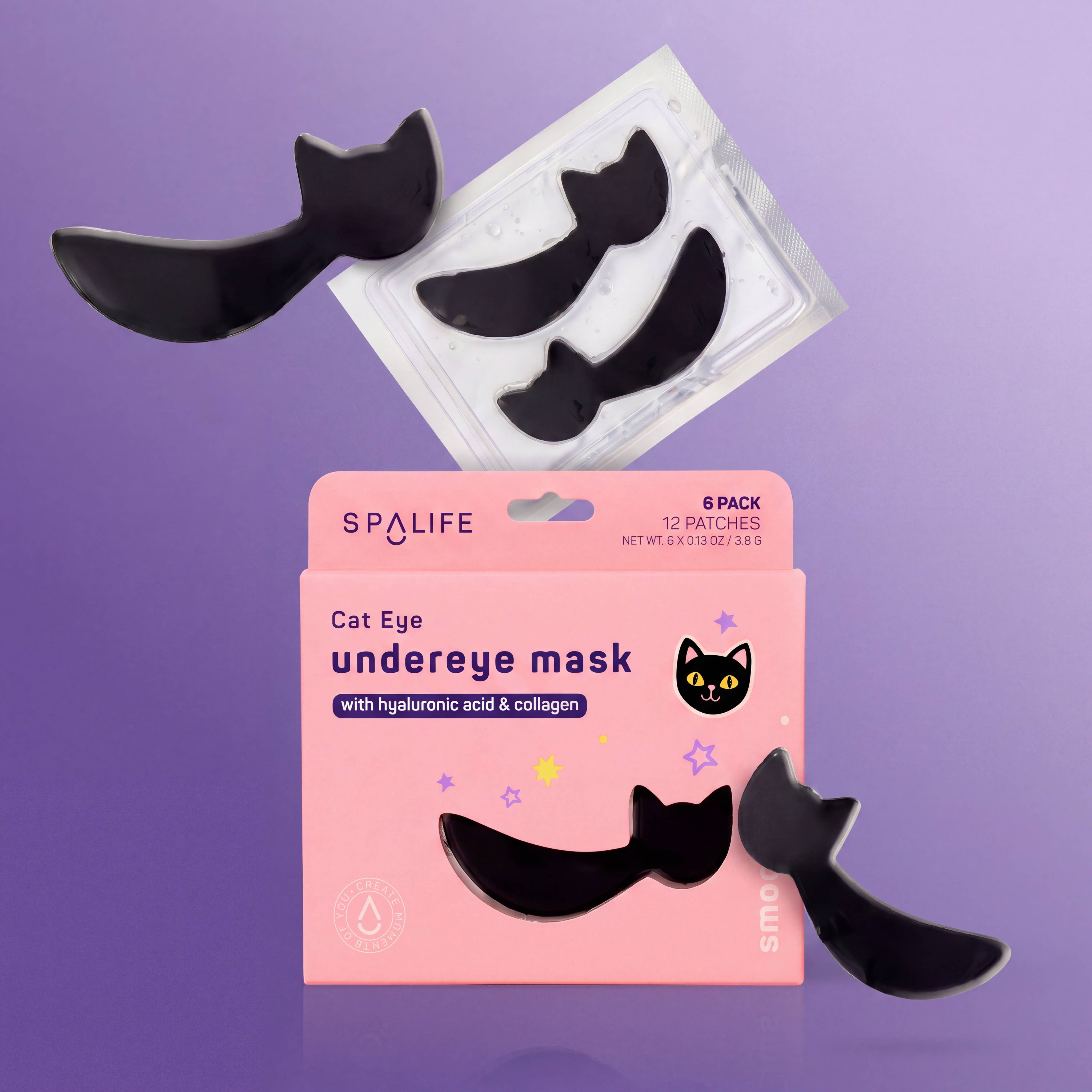 Six black cat-eye shaped undereye patches are shown with their pink retail box and one additional patch in a clear sleeve on a lavender background. The box reads 'SPALIFE Cat Eye undereye mask with hyaluronic acid & collagen' and '6 PACK 12 PATCHES'.
