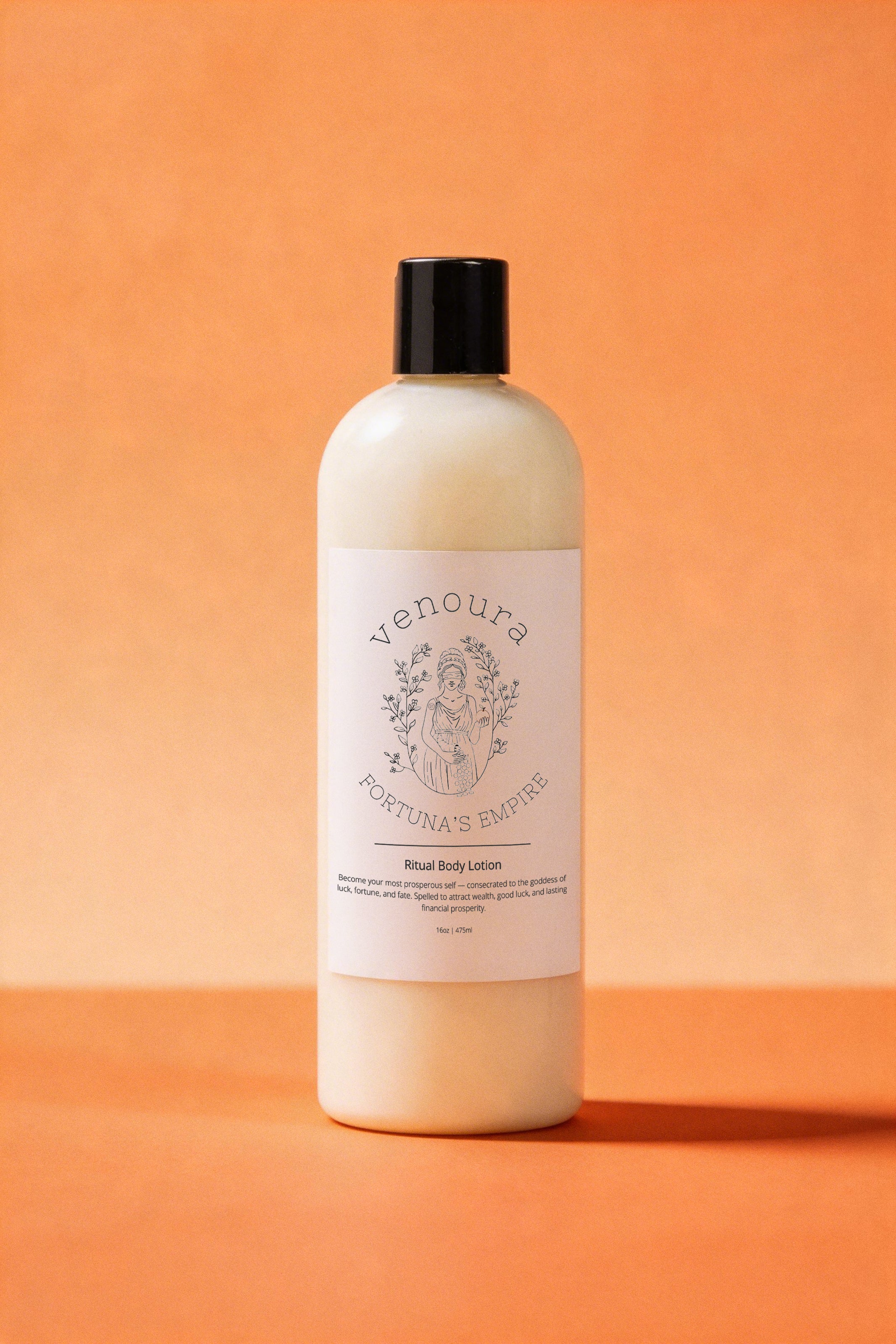 Venoura Botanica's Fortuna's Empire Ritual Body Lotion used for wealth, money drawing, prosperity, and abundance attraction in a 16oz pale yellow bottle with a black cap, set against a solid orange background.