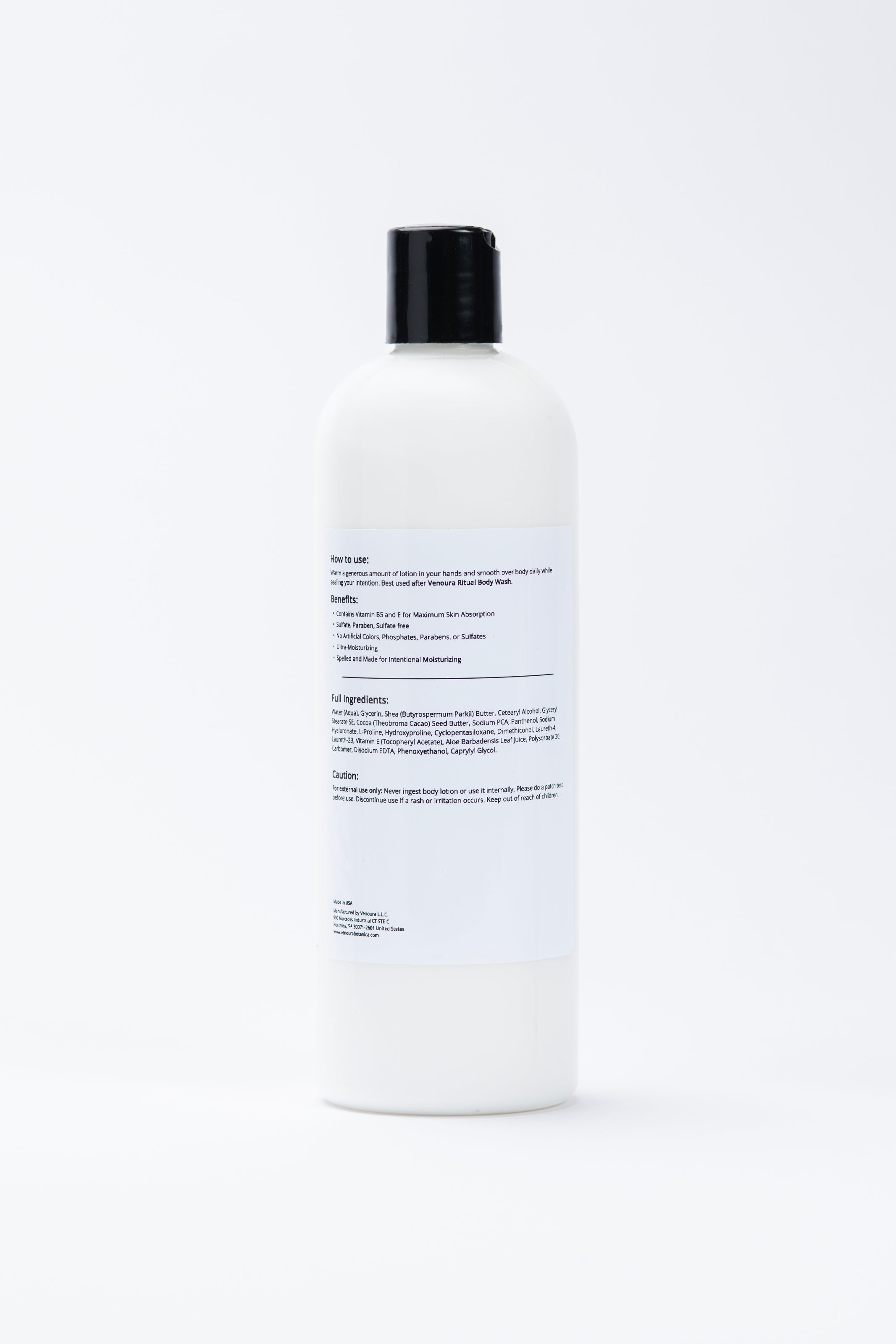 A  tall 16oz white bottle of Venoura Pure Reset Ritual Body Lotion used for spiritual protection, banishment, evil eye, skin-nourishing, and moisturizing with a black cap, shown from the back against a clean white background. The back of the bottle features a white label with black text.
